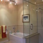 Bathroom renovation with tub and glass shower